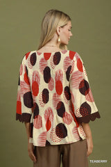 UMGEE Abstract Dot Smocked Peplum Top